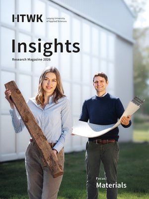 Insights 2026 a woman and a man holding materials