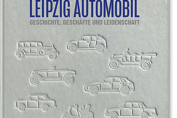 graues Buch mit kunstvollem Einband, Titel: Leipzig Automobil. Geschichte, Geschäfte und Leidenschaft