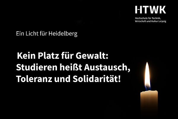 weiße Schrift auf schwarzem Grund - Zeichen für Heidelberg, Kerze